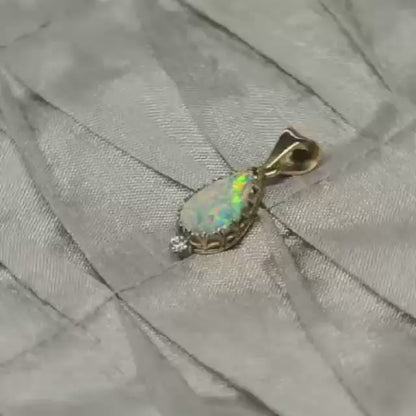 Lightning Ridge Opal Set in 9ct Yellow Gold with Diamond